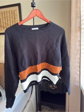 Crescent Black Crewneck Sweater with Orange and White Stripes